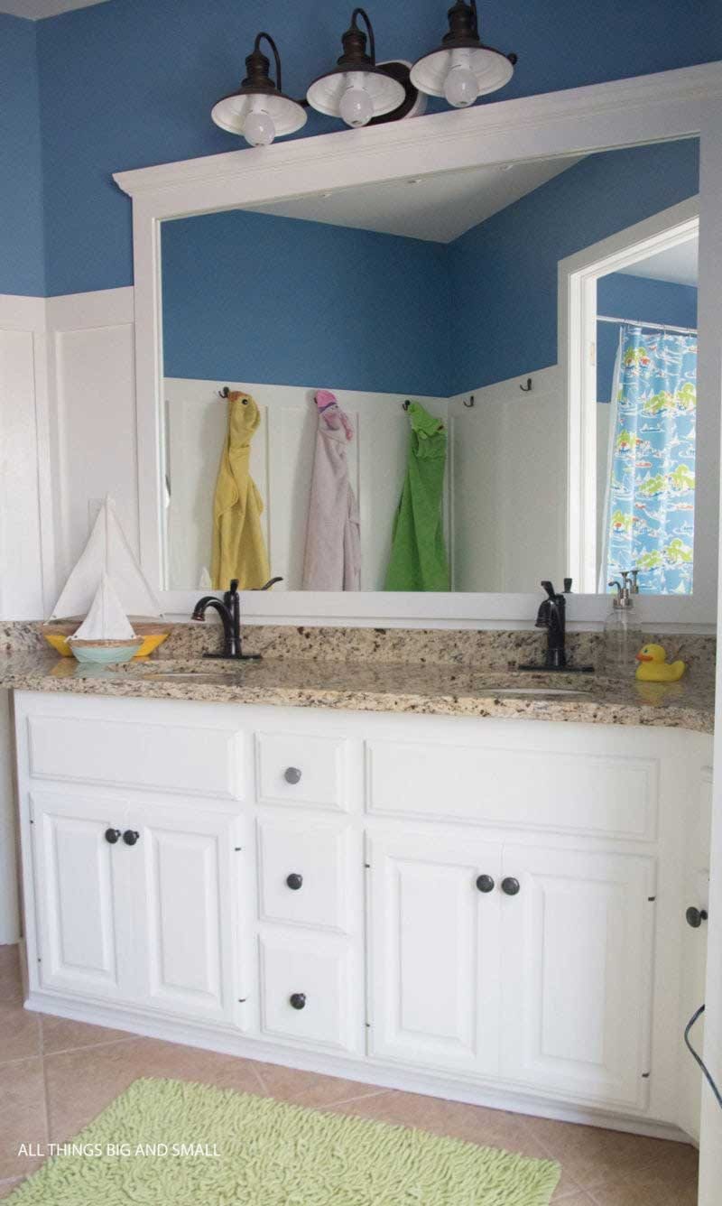 kids bathroom makeover ideas- shared kids bathroom with board and batten