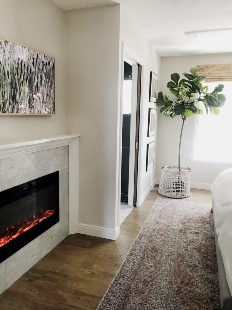 install a fireplace in your master bedroom like Chris Loves Julia did in their master