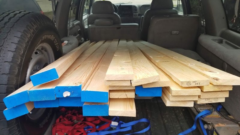 lumber in back of car for diy fire pit benches