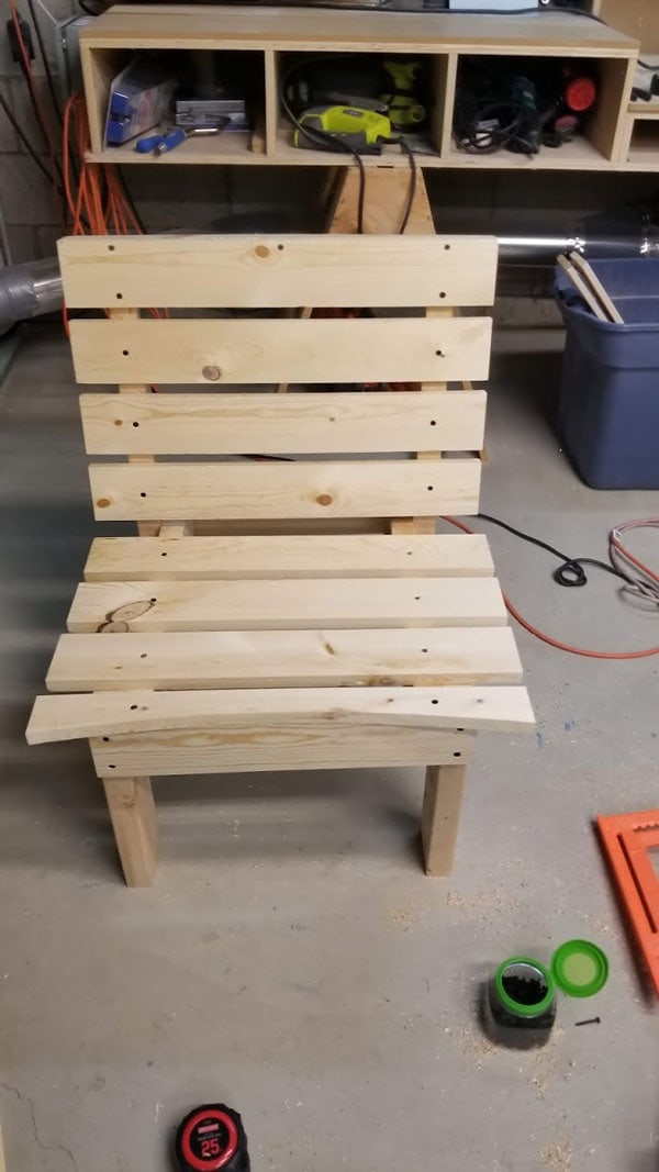 unpainted diy curved fire pit chair bench in basement