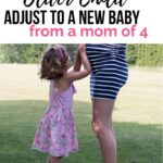 older child hugs pregnant mom belly--how to help your older child adjust to new baby