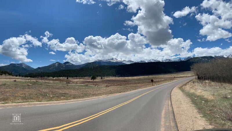 road with clouds in the background--road trip with kids activities and game ideas