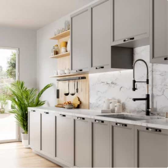 gray painted kitchen cabinets with marble backsplash