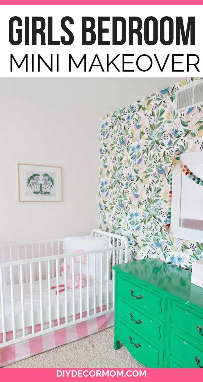 pink walls in girls bedroom with floral accent wallpaper in green