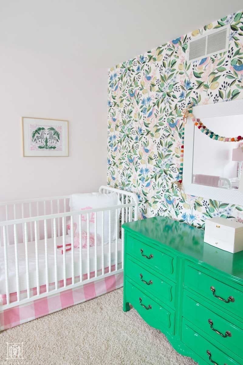 crib with wallpaper-- what are the things new moms need for the newborn period