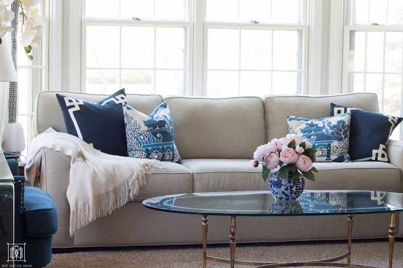 living room with blue and white pillows