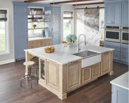 blue kitchen cabinets with wood island