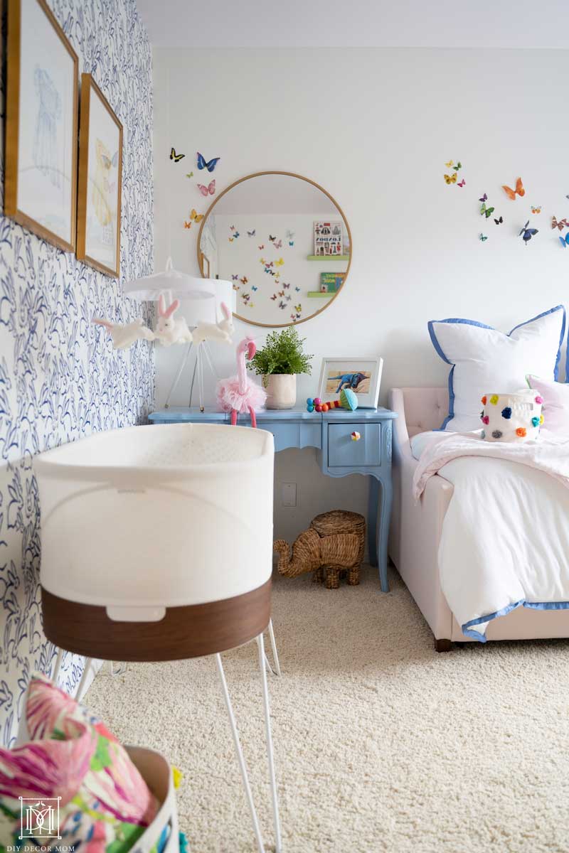 nursery with snoo smart sleeper and white walls