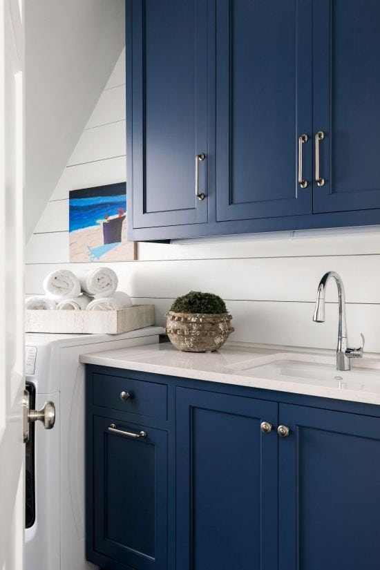 Sherwin-Williams cabinets in laundry room with white shiplap walls