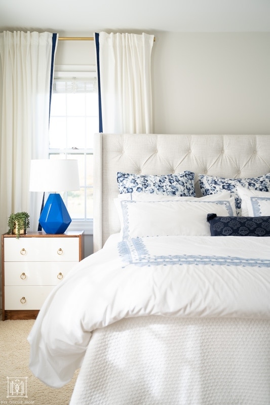 neutral gray paint colors in bedroom with white bedding- BM Classic Gray warm gray on walls