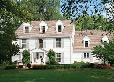 chantilly lace exterior on white colonial house with stonington gray shutters