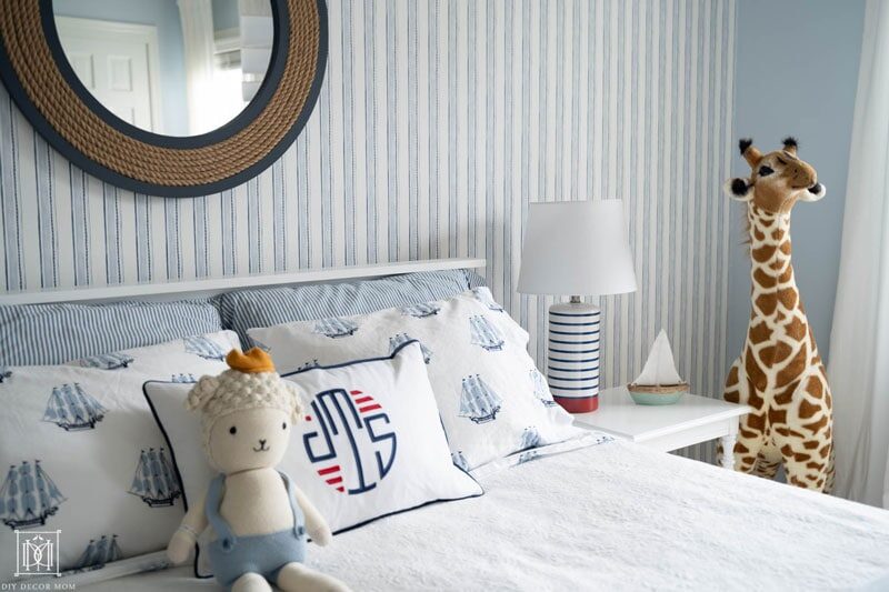 blue and white stripe wallpaper in little boys room