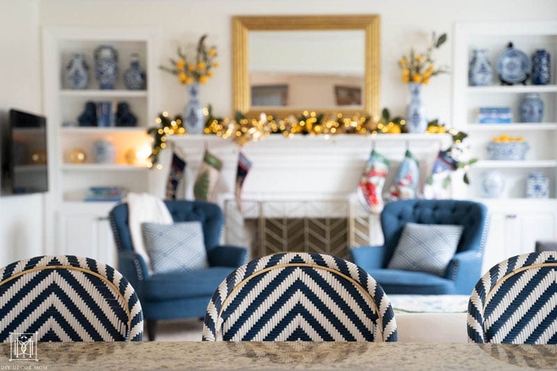 blue and white chevron stools with blue and white shelves in background