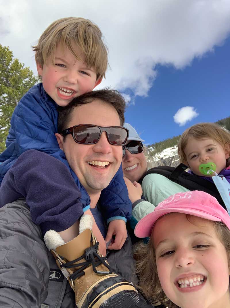 family photo of young kids hiking