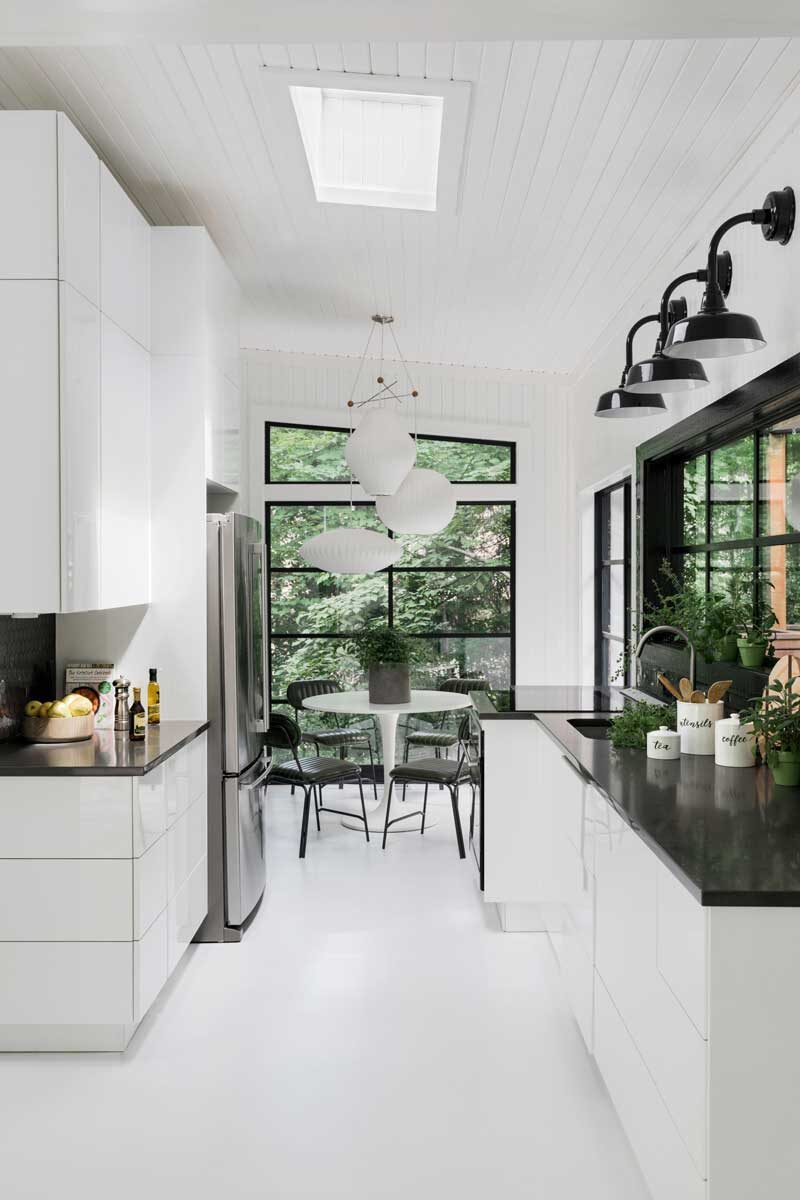 white modern kitchen with skylights