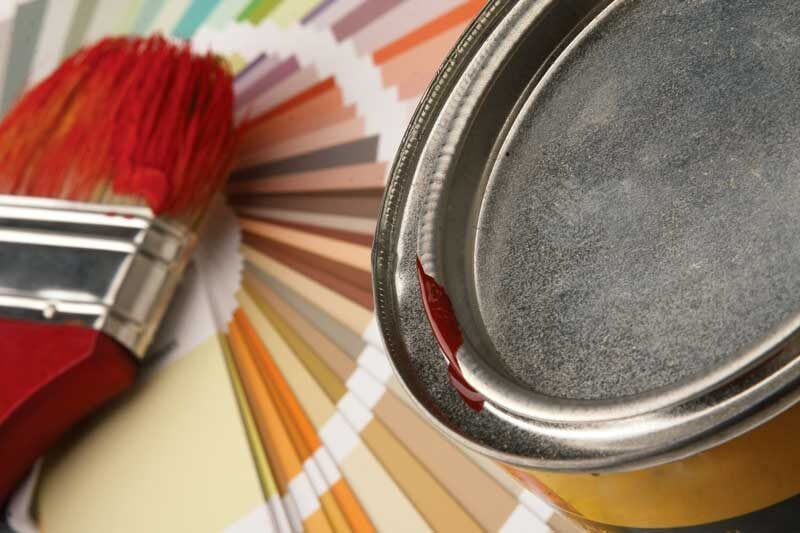 warm paint shades with paint brush with red paint