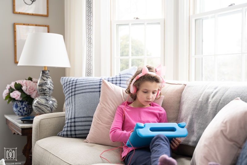 girl reading on ipad tablet