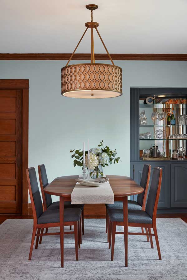 valspar grey brook dining room with wood furniture