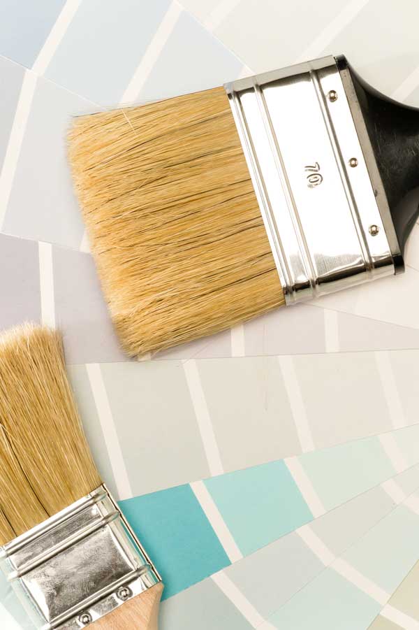 cool white paint shades and paint chips and a paint brush