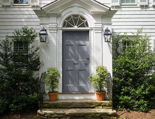 BM Platinum Gray front door on white colonial