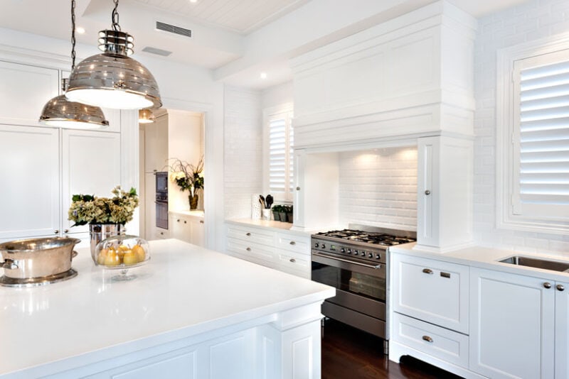 best cabinet colors for kitchen islands and walls-- crisp white kitchen with marble countertops