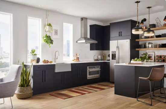 black modern kitchen with red rug