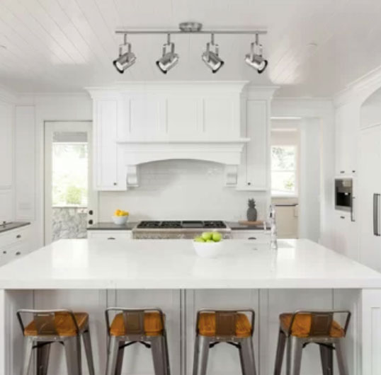 bright white kitchen cabinets and walls in kitchen