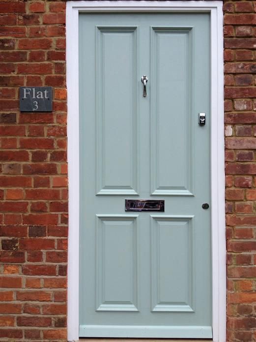 Farrow and Ball Green Blue front door with brick exterior