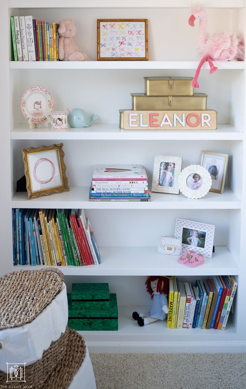 girls bookcases with detailed shots of decorative accessories and picture frames