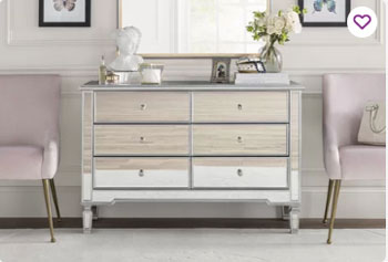 gorgeous glam mirror dresser in white room with beautiful white trim paneling and baseboard