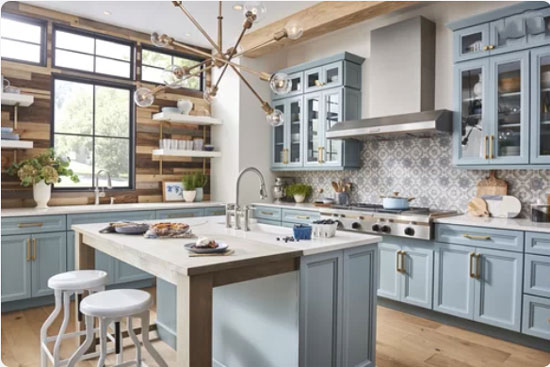 light blue kitchen cabinets with wood accent wall