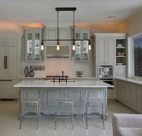 light gray greenish cabinets with lucite countertop stools