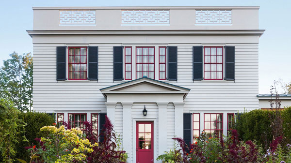 Benjamin Moore Umbria Red front door design by Katie Ridder