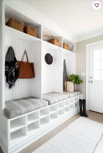 coastal white built-in cabinets in mudroom