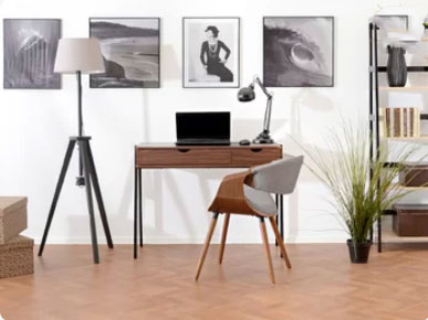 white walls in home workspace with modern wood desk and lamp