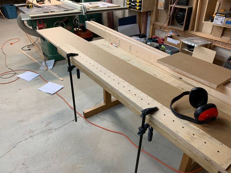 drill holes for built-in bookshelves