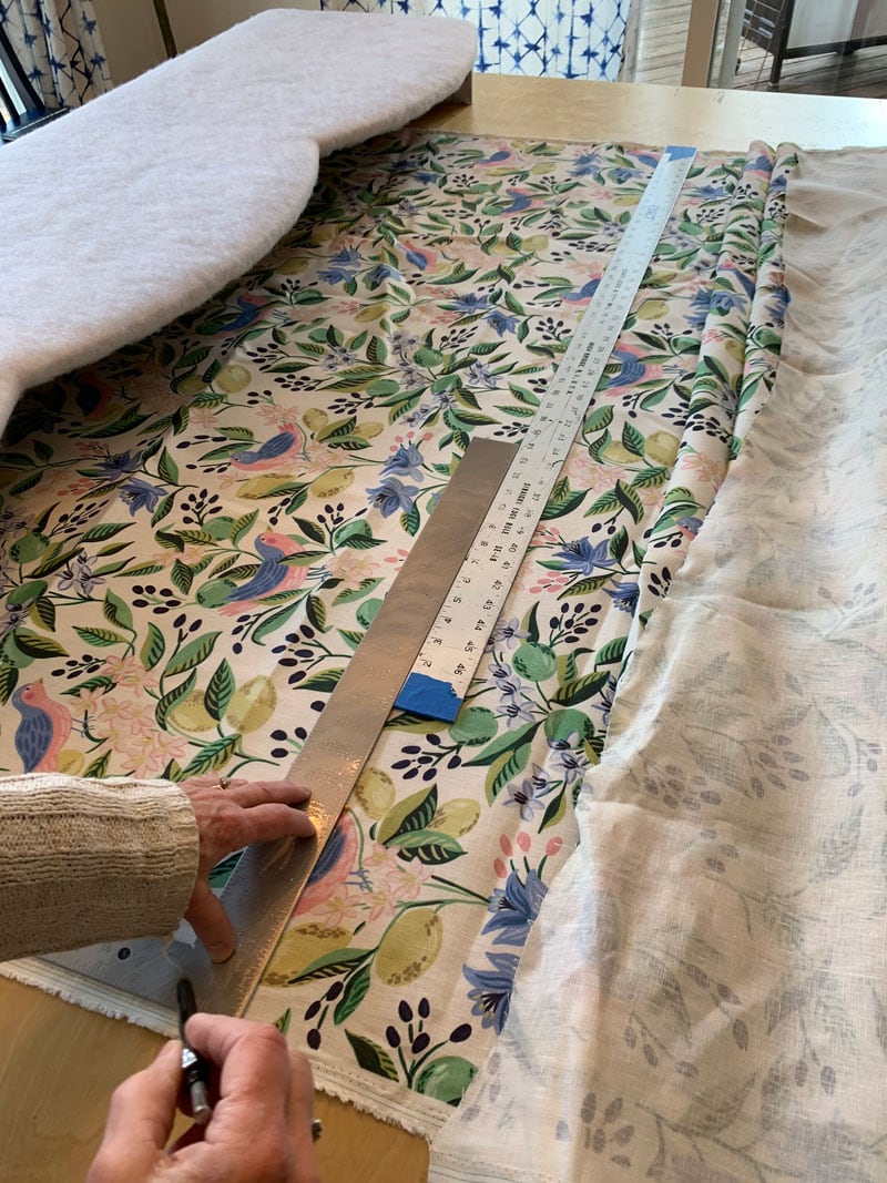 seaming together fabric to cover a window cornice