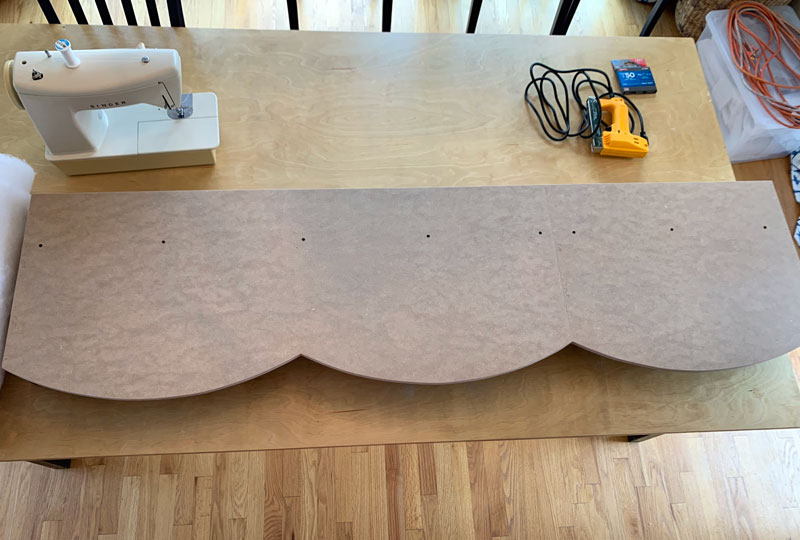 scalloped cornice board ready to be covered with batting and fabric