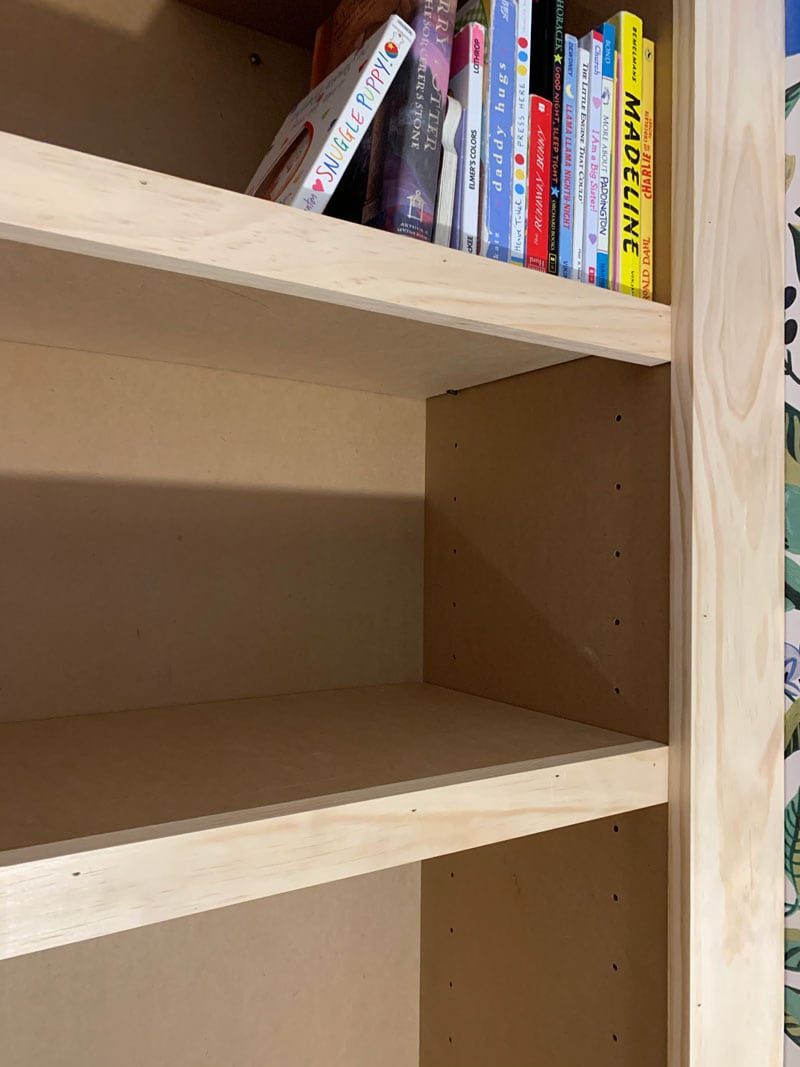 shelves and trim on diy built-in bookshelf