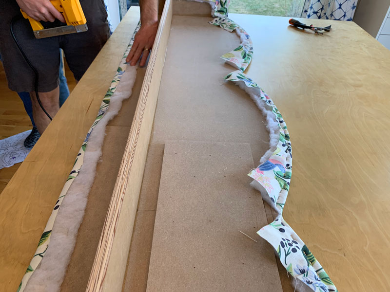 scalloped design window cornice upside down on table