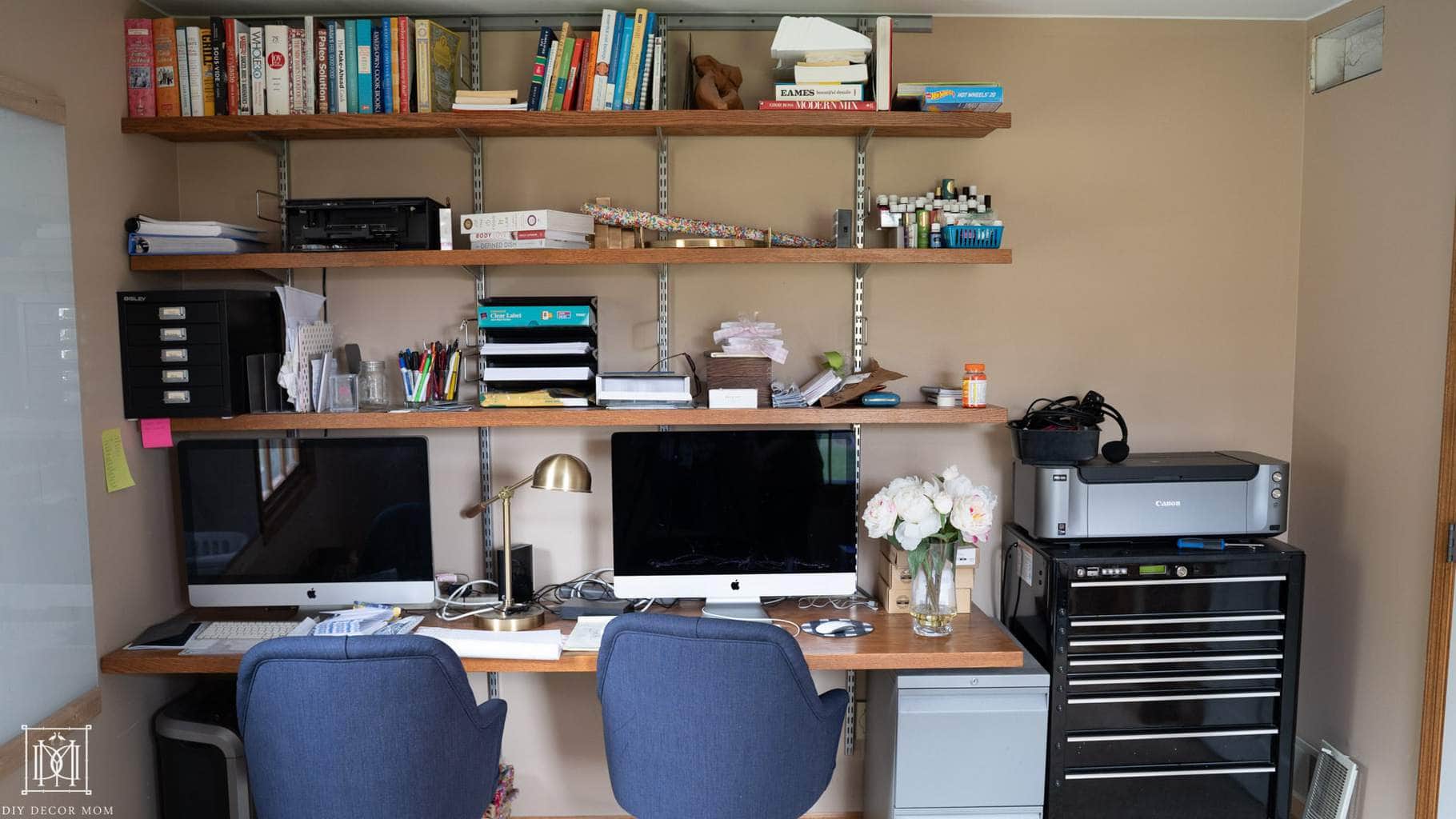 ugly before photo of home office with built-in shelves and two desks