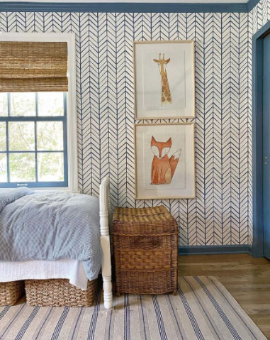 amy studebaker design boys room with blue and white wallpaper and bamboo blinds